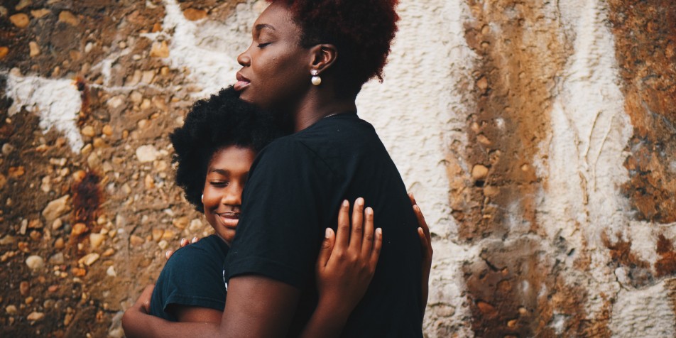 two girls hugging