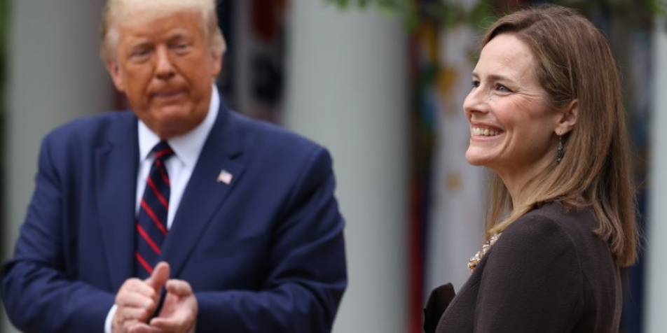 President Trump clapping for a smiling Amy Coney Barrett 