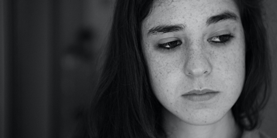 young woman: forlorn