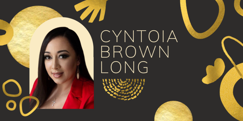 cyntoia brown long headshot. she has long, straight, black hair, gold earrings and a red suit jacket. Her headshot is set against a dark brown background with gold foil organic shapes