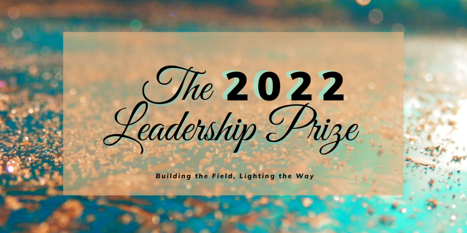 gold glitter on shiny teal surface with overlaying words that say "the 2022 leadership prize" and a subheading that reads "building the field, lighting the way"