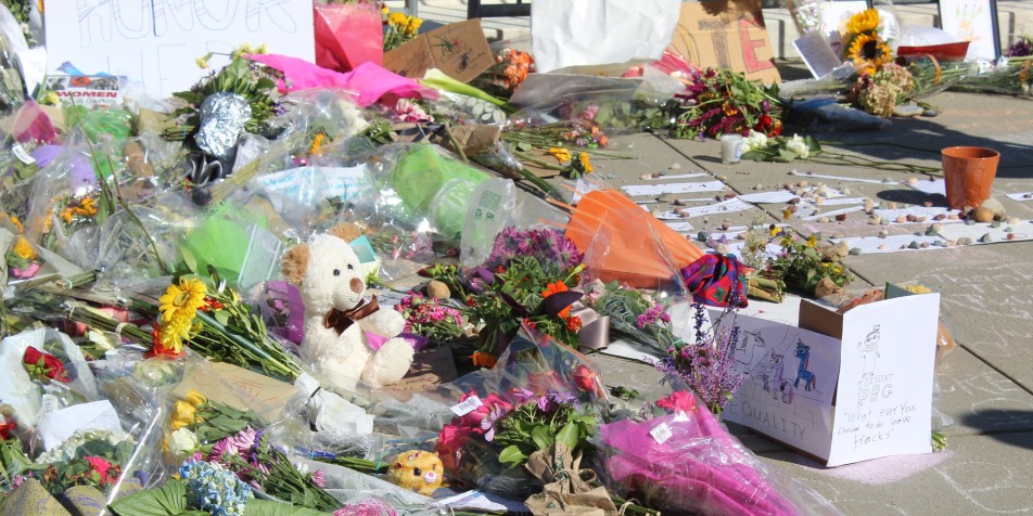 memorial with flowers and teddy bears