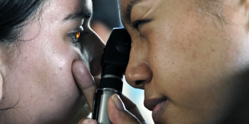 Photo of someone getting and eye exam.